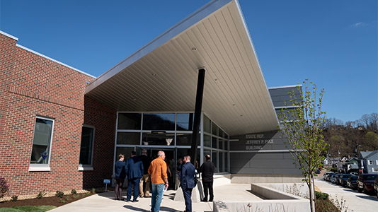 Students walking toward the entrance of BC3 Armstrong's Jeffery P. Pyle Building